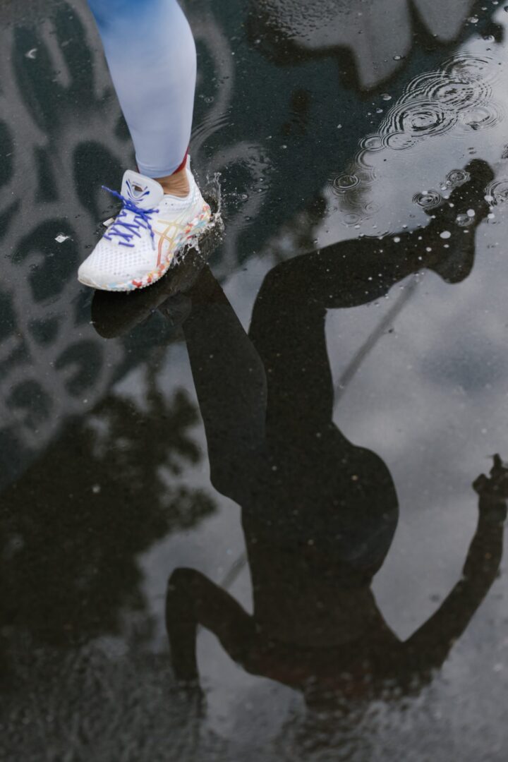 girl running shadow in water