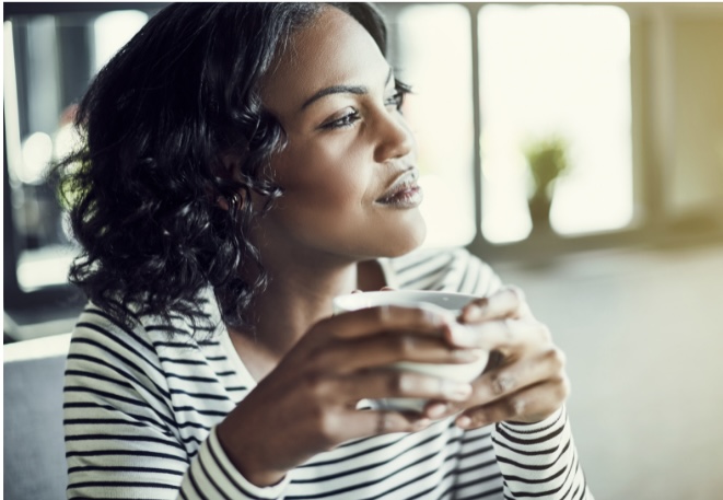 A person drinking coffee