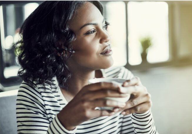 A person drinking coffee